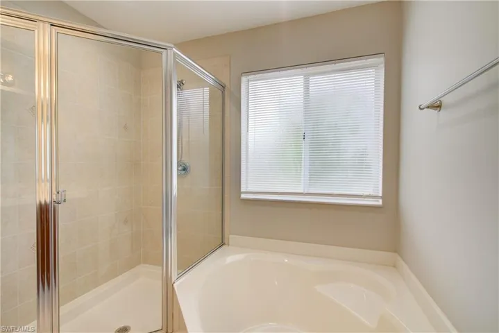 Bathroom featuring separate shower and tub