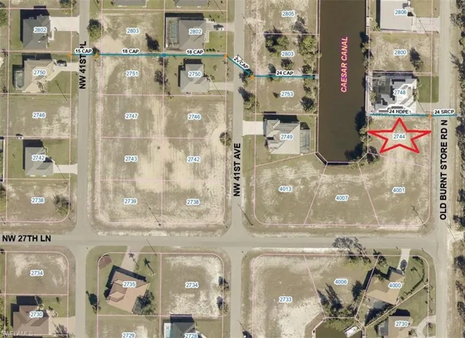 Aerial view of property's location with property parcel outlined