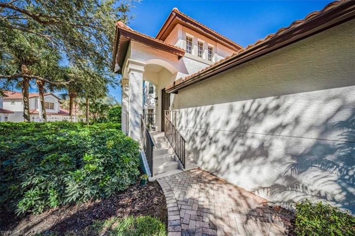 Corner lot - nicely landscaped entrance. Steps from Pool and Clubhouse!