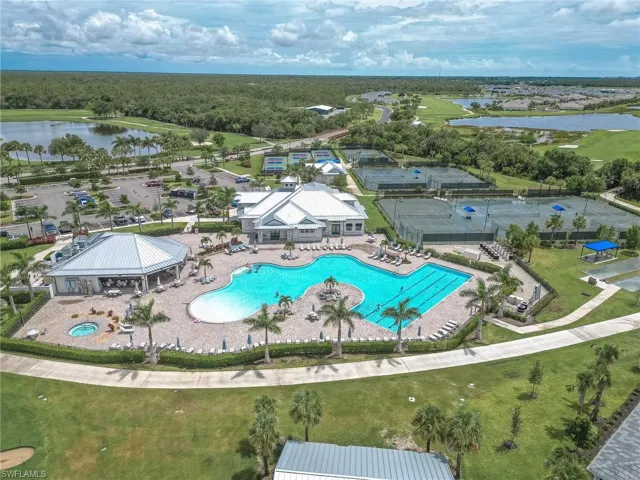 Aerial view of a large body of water and a pool area