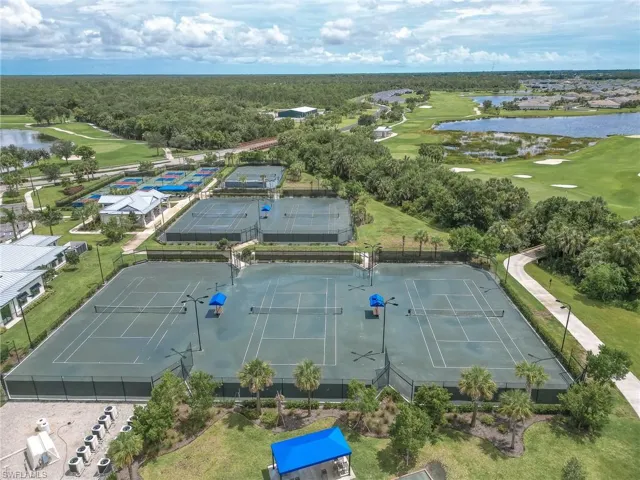 Aerial view of a nearby body of water and a golf club