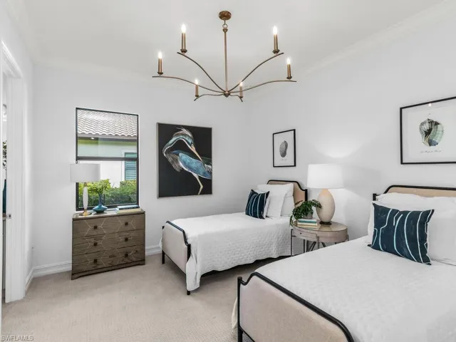 Bedroom with en suite bathroom and walk-in closet.