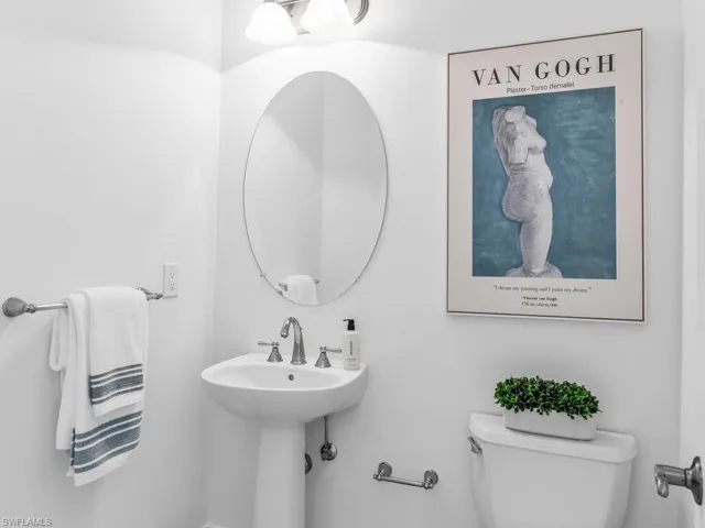 Half bathroom off of the living room area.