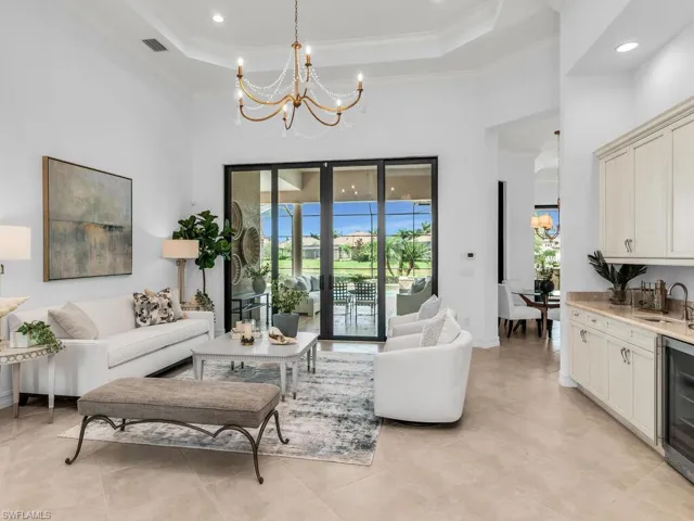 Beautiful entry way with views of the pool and lake.