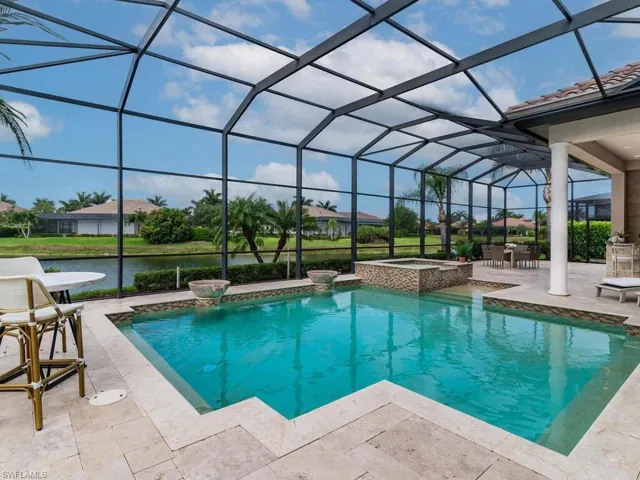 Heated pool with water features.