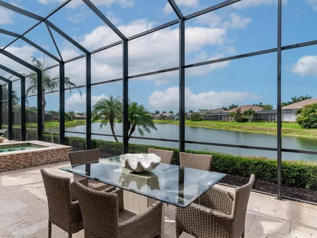 Pool-side entertaining space with lake views.
