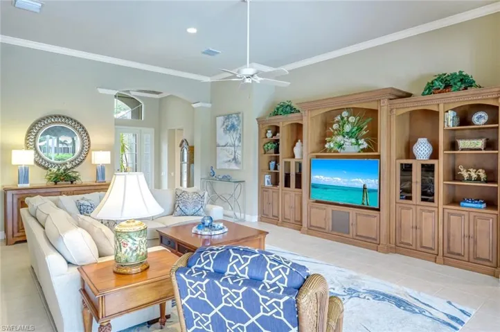 Volume Ceilings and Crown Moldings elevate your generous Great Room!