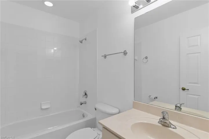 Full bathroom with vanity and tub / shower combination