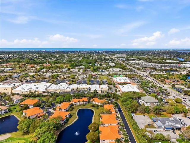 Aerial view of residential area with a nearby body of water
