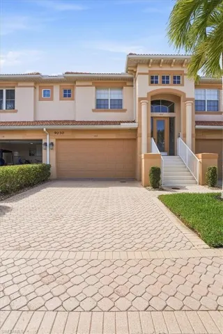 Mediterranean / spanish-style house featuring stucco siding, decorative driveway, a garage, and a tile roof