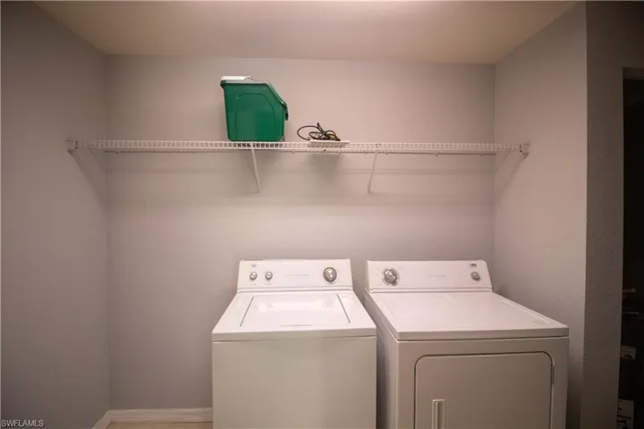 Laundry room featuring washing machine and dryer