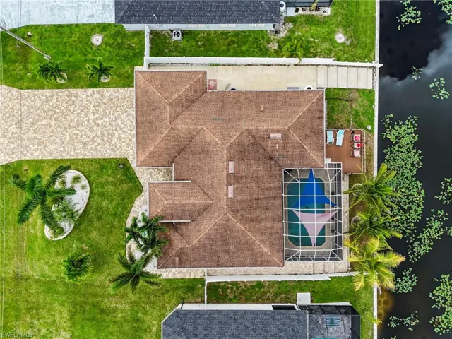 Drone / aerial view of a pool area