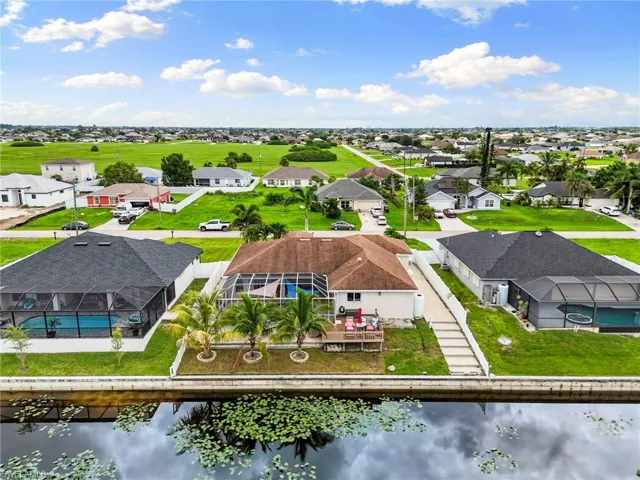 Aerial view of residential area with a nearby body of water