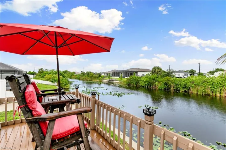 Wooden terrace with a water view