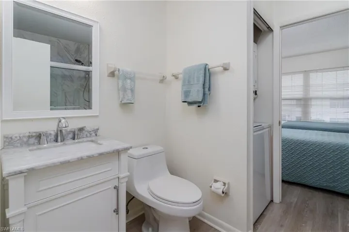 Tile flooring, ceiling fan, impact glass picture window
