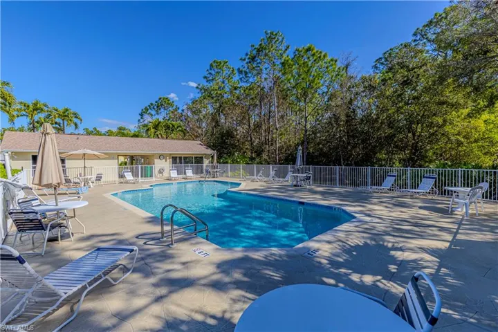 Community pool with patio area & Clubhouse.