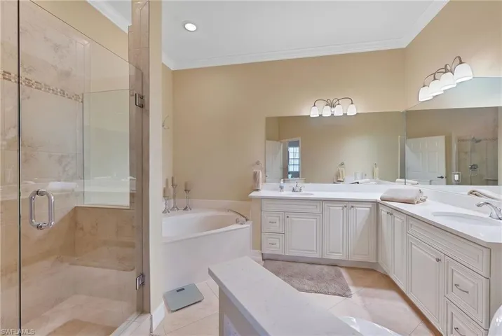 Digitally Enhanced/Staged with white cabinets