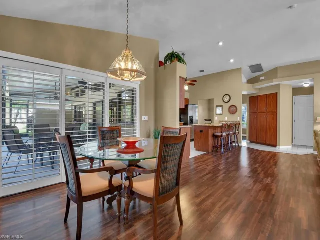 Dining room featuring hardwood / wood-style flooring and ceiling fan