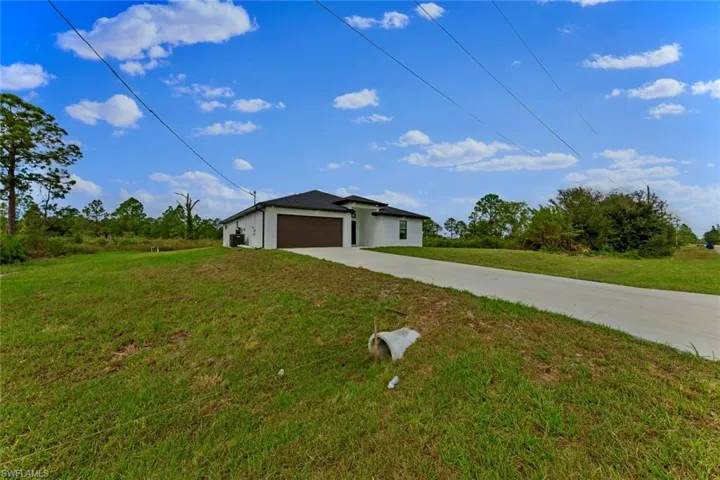213  Irving  AVE, Lehigh Acres, FL 33936