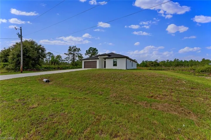213  Irving  AVE, Lehigh Acres, FL 33936