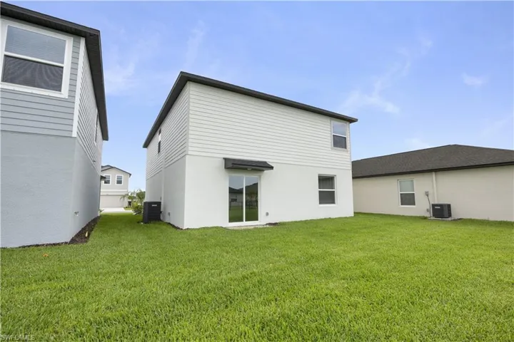 Spacious green lawn surrounding the property