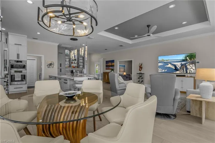 Dining area for 6 in addition to the bar stools at the center island.