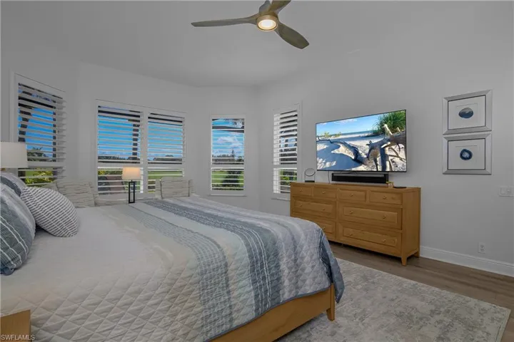 Sized for king-size bed and two end tables, modern ceiling fan.