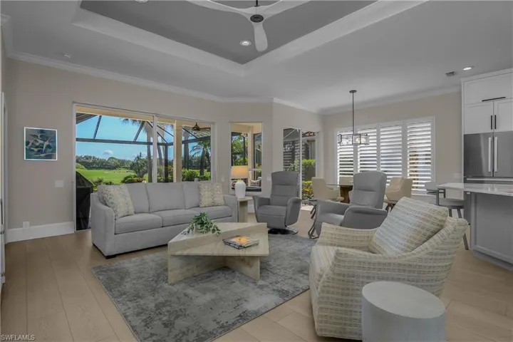Great room with entry to lanai. Master bedroom doorway (not pictured) is at upper left.