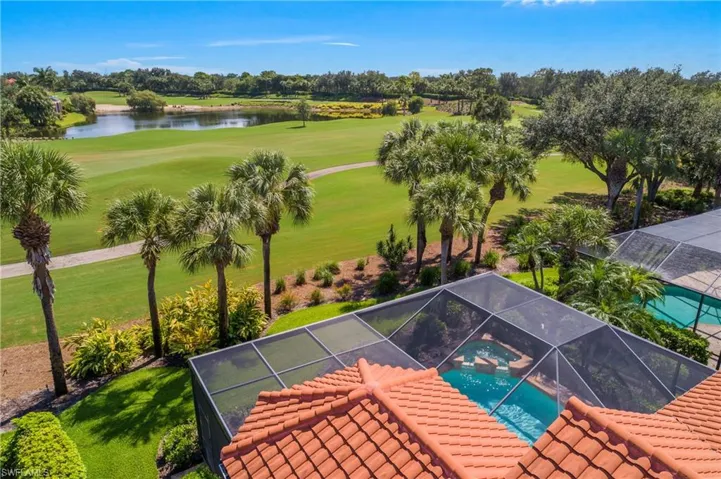 Your "backyard' showcasing long range open views of SWCC's south course #6 fairway and green to right, stretching across to the 7th fairway over a sparkling distant lake.