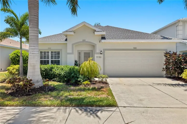 View of front of home with a garage