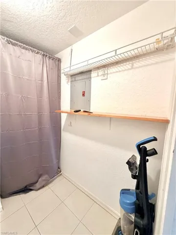laundry room with ac unit