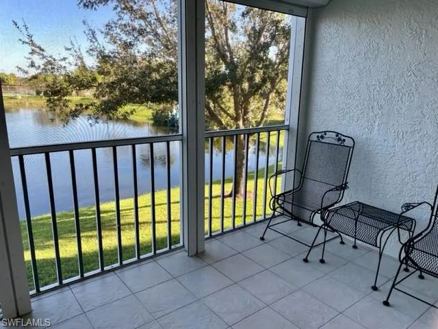 Screened Balcony with a water view and electrical Hurricane shutter