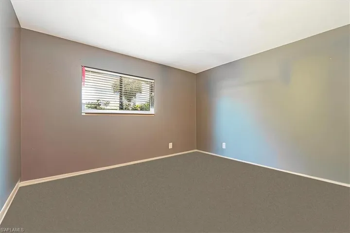 3rd Bedroom with carpet. This room was digitally cleaned with items removed to show the space