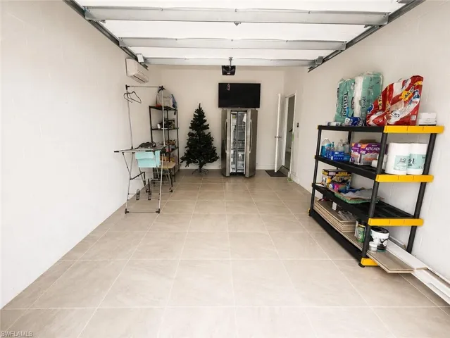 Bonus Extra Garage with Tiled Floor and AC
