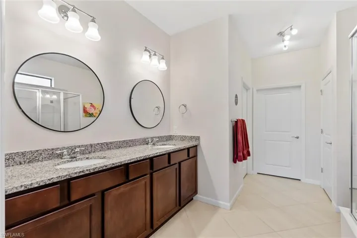 Primary Suite bathroom with dual sinks