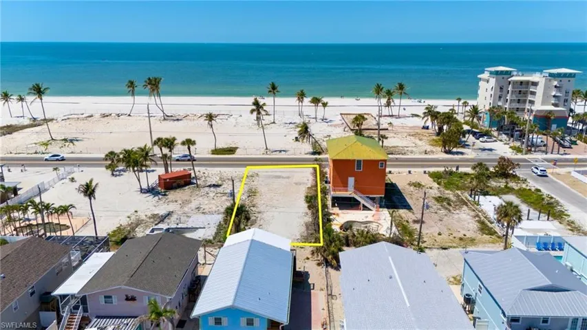 Aerial view featuring a water view and a view of the beach- VIRTUALLY EDITED EXTERIOR IMAGE