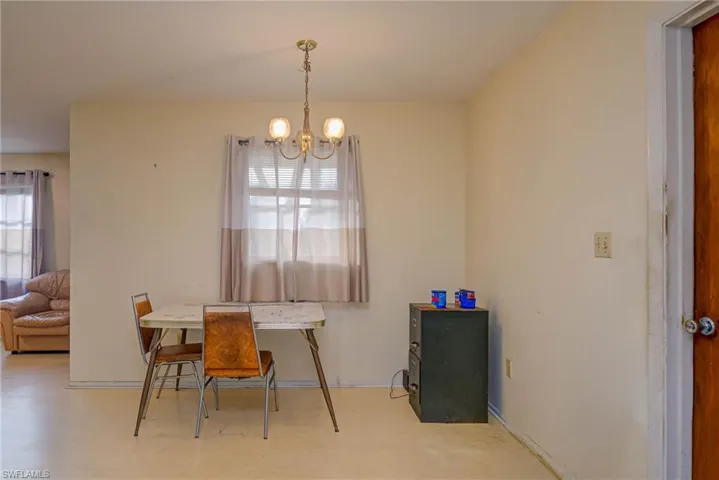 Dining space with a notable chandelier