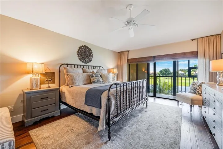 Master Bedroom with ceiling fan, access to your screened in lanai