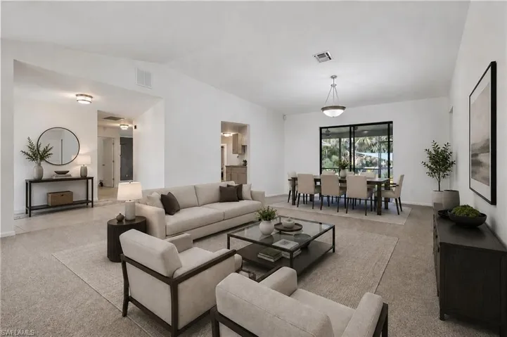 Virtually staged formal living and dining area