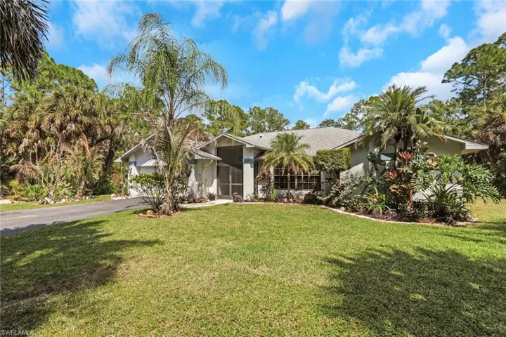 Beautiful home with lush landscaping throughout the property. Home is nicely set back and fully private.