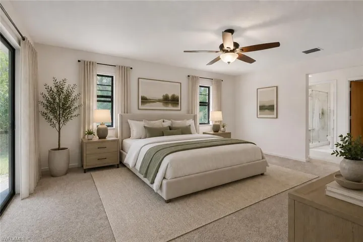 Virtually Staged master bedroom. Spacious master with access to the lanai.