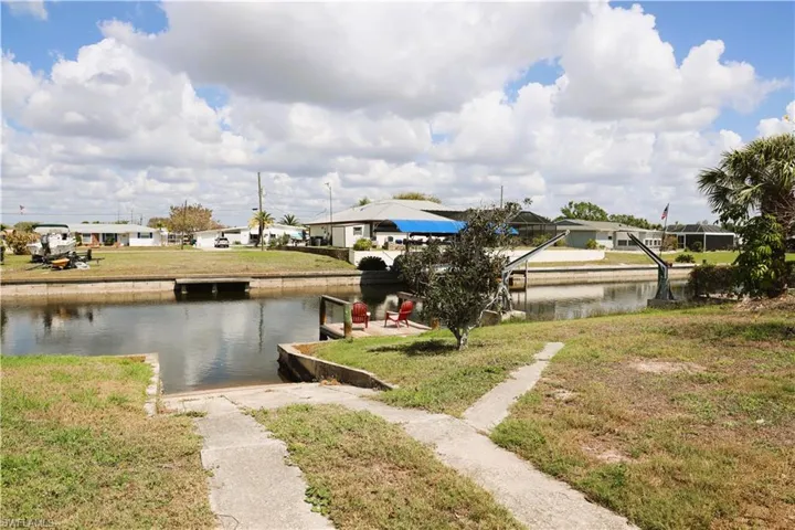 Water view with nearby suburban area