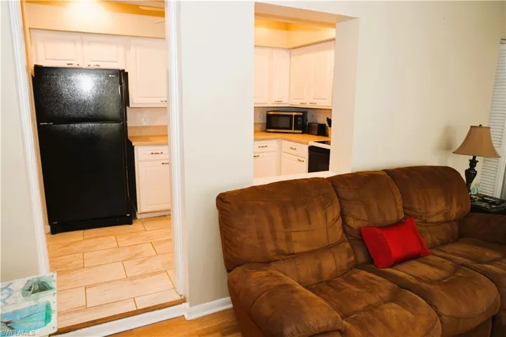 Living area featuring light wood-style flooring