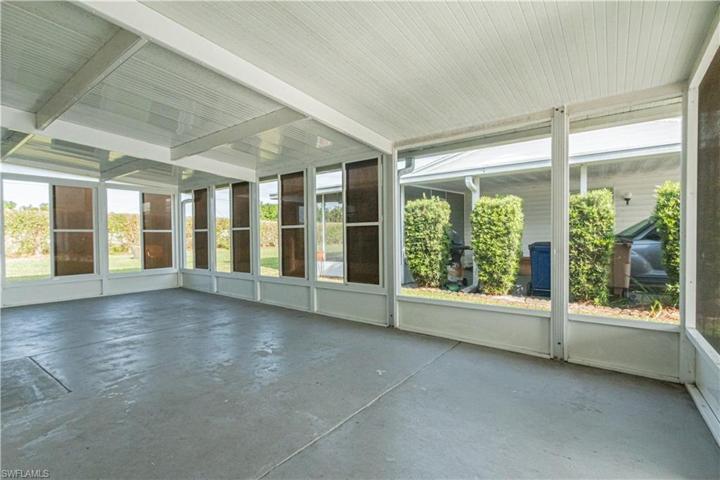 Florida Room- Enclosed with sliding windows. Screened in.