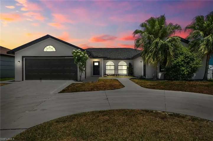 View of front of home with a garage