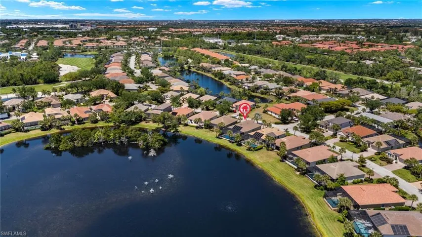 Bird's eye view with a water view and a residential view