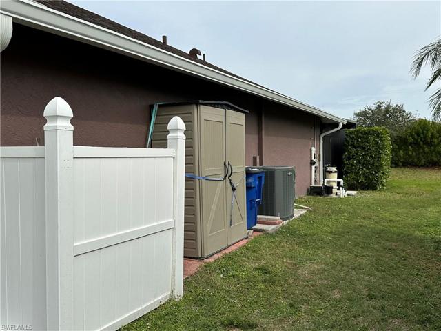 Fence to Conceal Receptacles & Utility/Storage Closet