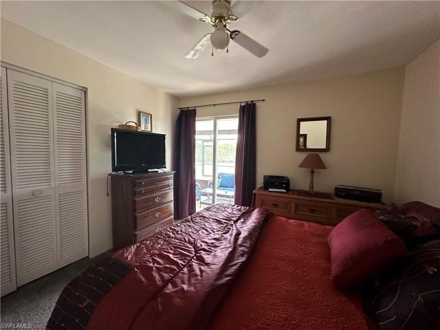3rd Bedroom with access to Covered & Screened Patio/Pool Area