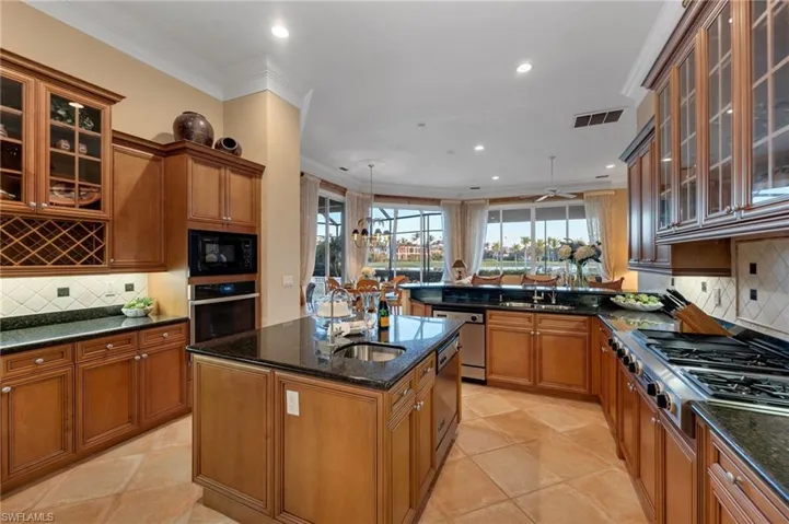 This kitchen is spacious and ready for your designer wishes to make it your own Chef's Kitchen!