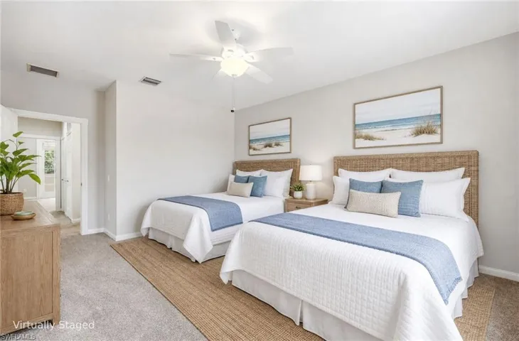 Virtually staged oversized Bedroom #2 on second floor with two Queen size beds